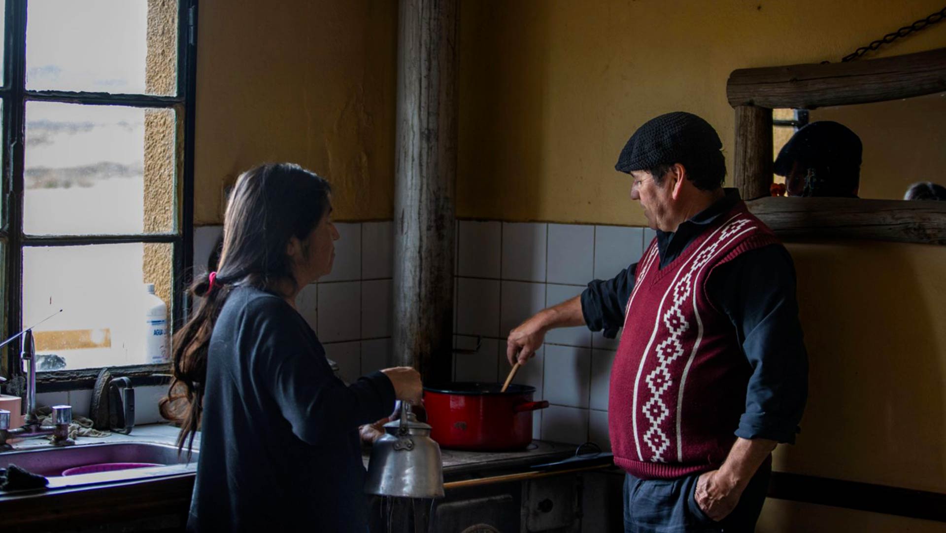 Angel and Susana Gauchos cooking at Rancho Patagonico Santa Cruz Tierra Salvaje Luxury Adventure Travel Experience