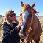 Cristina Massera Doctor in Geology and investigator at Tierra Salvaje with a horse on the Luxury Patagonia Experience