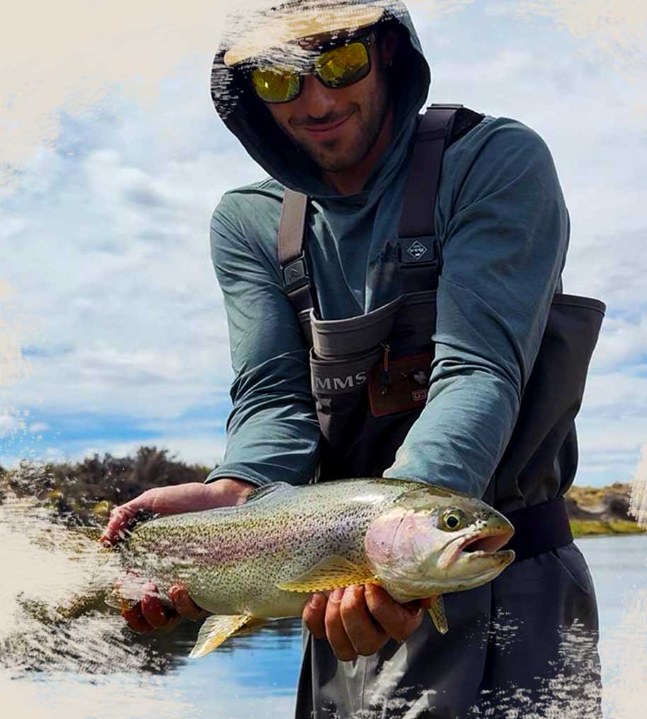 Gonzalo De Orta Fishing Guide with Rainbow Trout at Rio Mayo La Angelita Tierra Salvaje